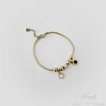 Brățară Nero Tempus Charms Gold cu pandative inscriptionate cu cifre romane bijuterie dama Pinolli