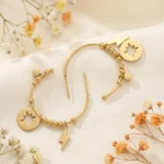 Cercei Stella Charm auriu 14k cu stea si cristal