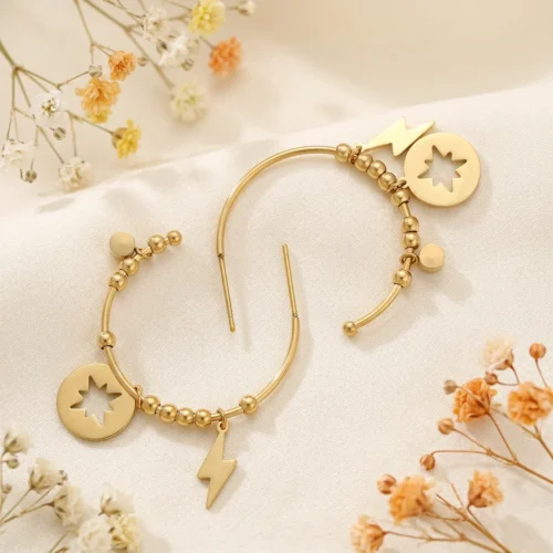 Cercei Stella Charm auriu 14k cu stea si cristal